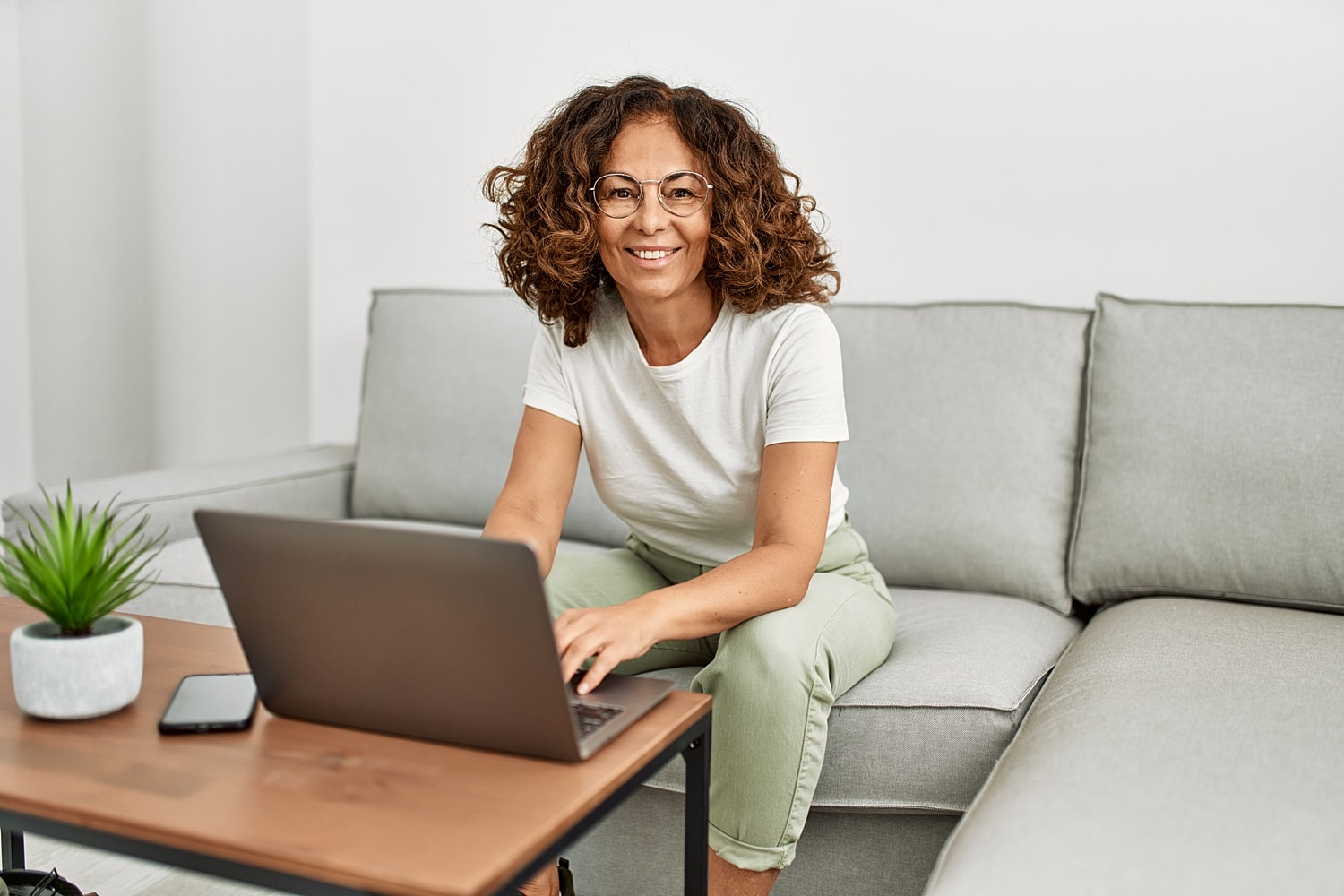 Person video chatting on a laptop. 