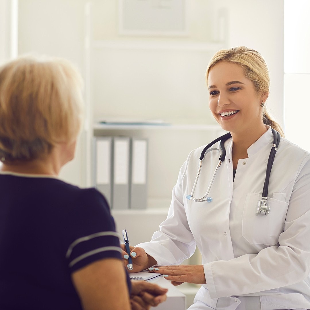 Business meeting with diverse professionals engaged in discussion.