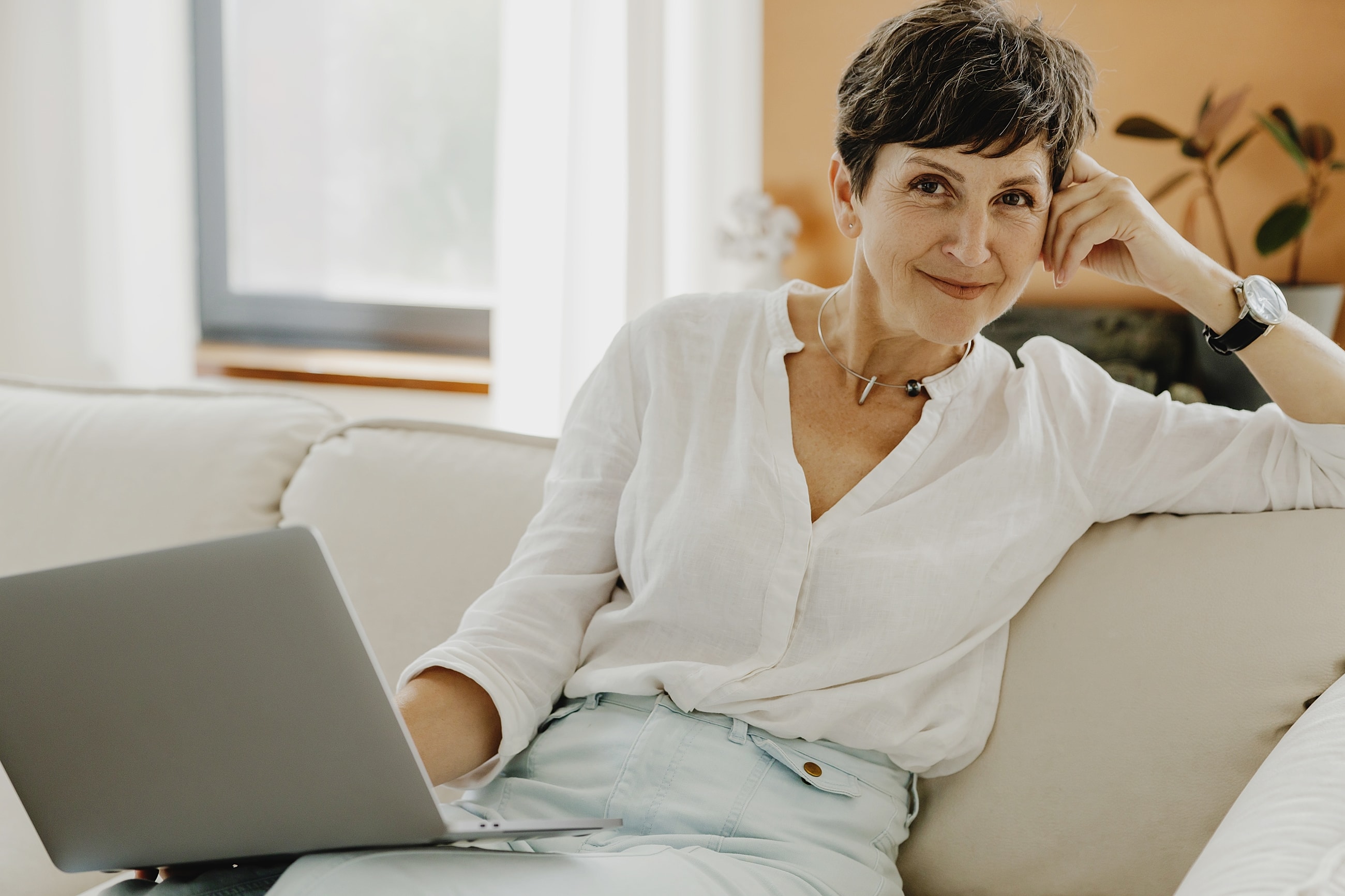 Woman on video call using a tablet device.