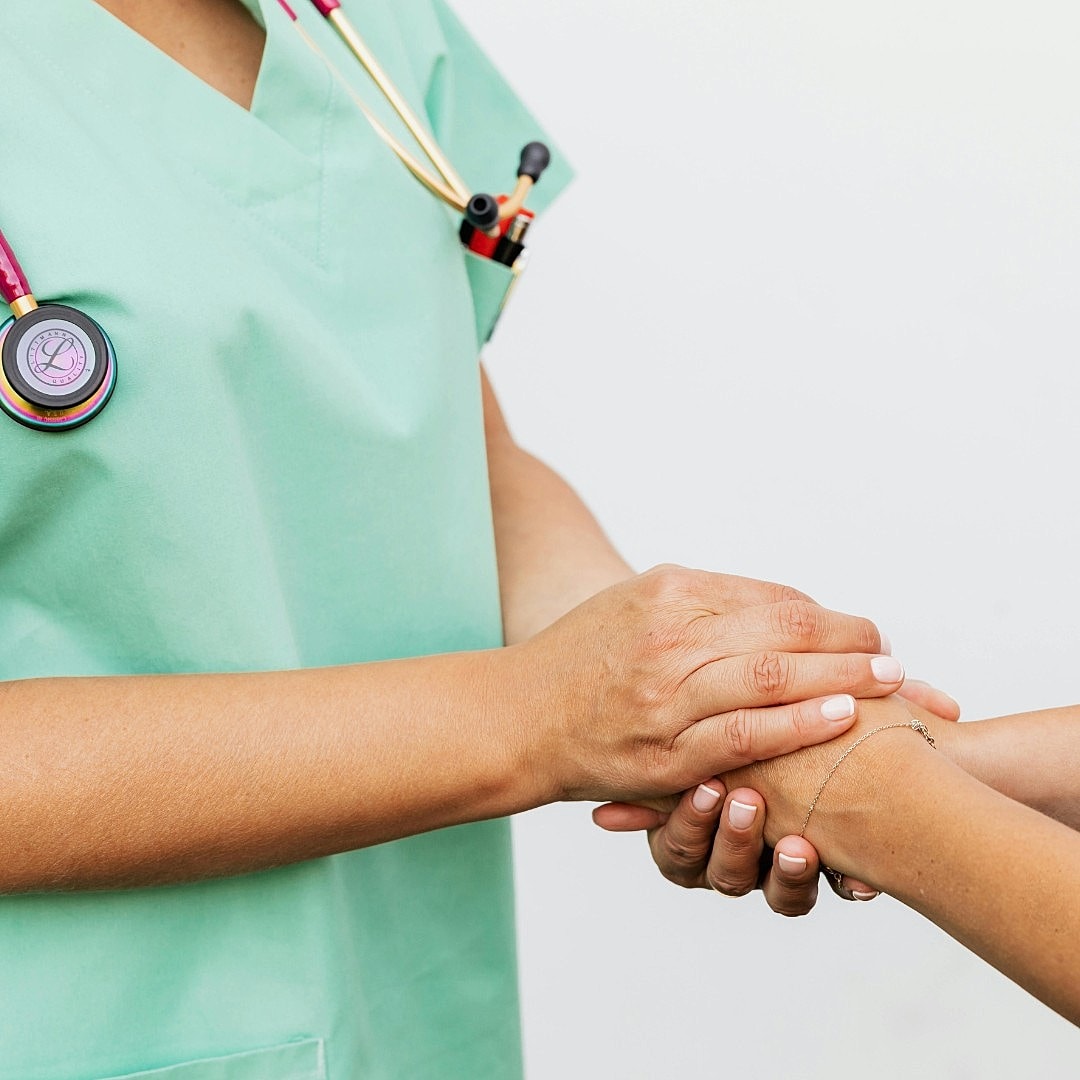 Video call between two smiling individuals