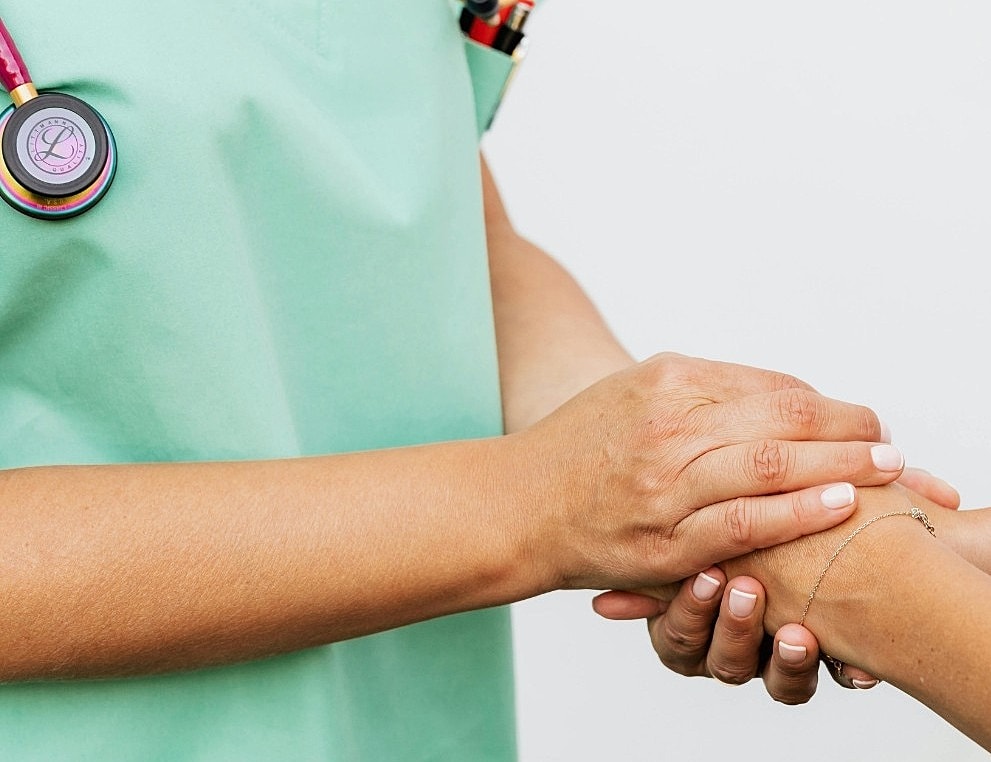 Video call between two smiling individuals